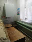 3/100 доли в праве на нежилое двухэтажное кирпичное здание из общей площади 472,4 кв.м. и 3/100 доли в праве на земельный участок по адресу: Ярославская область, м.р-н Даниловский, с.п. Дмитриевское, д. Скоково, ул. Центральная, д.10